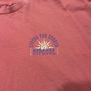 Size medium/ Pink/ purple and white writing